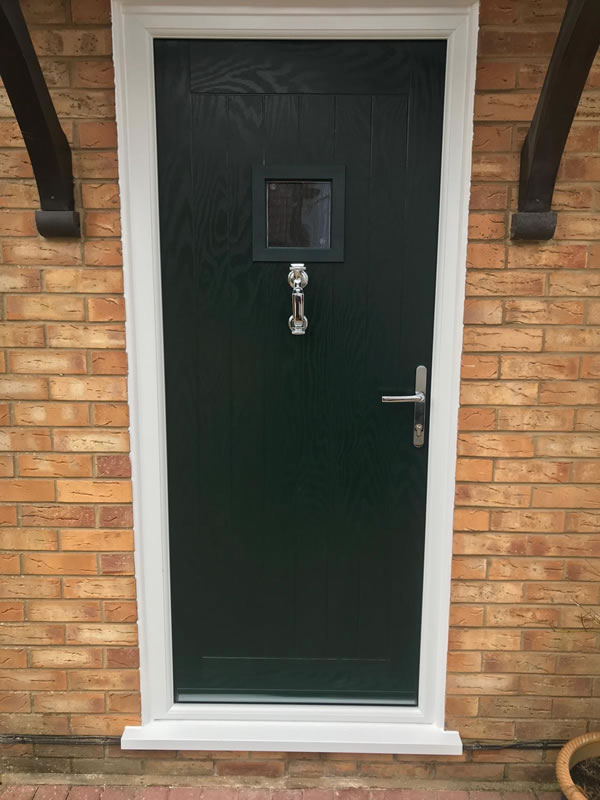 Chartwell Green composite front door resembling traditional timber